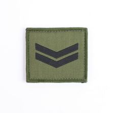Corporal rank patch hook and loop backed. Green