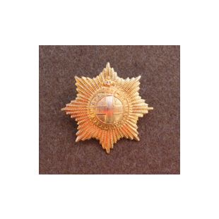 Coldstream Guards Cap badge.