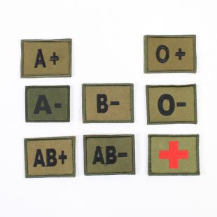 Hook and loop backed blood group badge. Green.