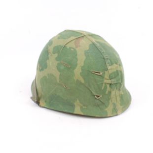 Original Vietnam helmet with camouflage cover and liner 1966